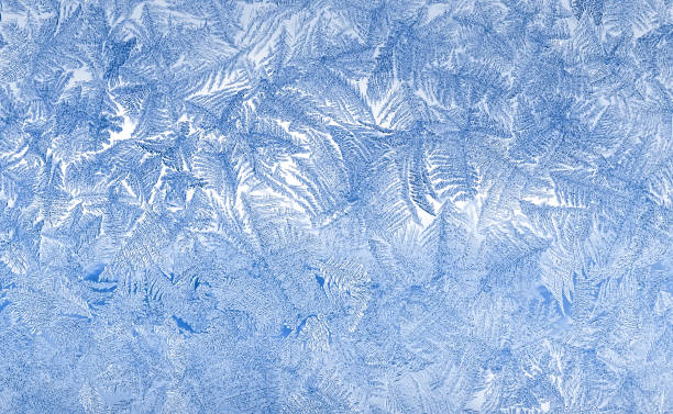 blue frost on the glass. - crystallization imagens e fotografias de stock