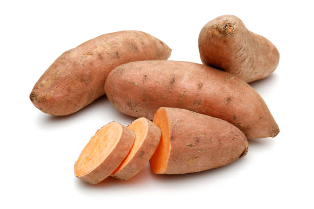 istock Raw sweet potato with slice isolated 1191221105