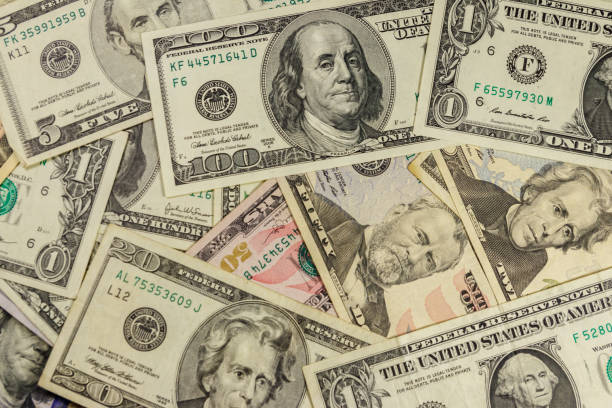 istock Background of different us dollar banknotes 1191223596