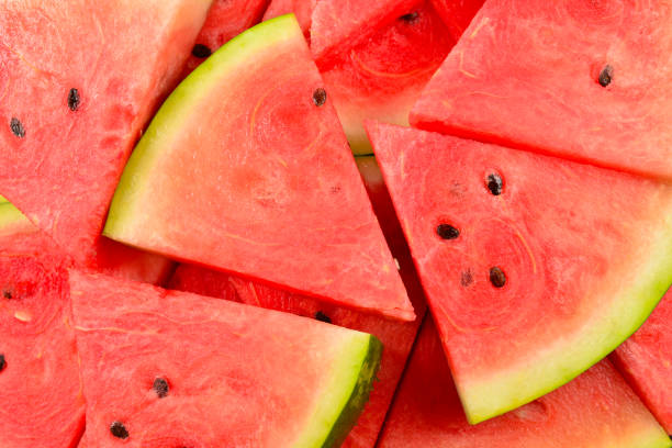 istock Juicy watermelon slices background. Top view. 1191224513