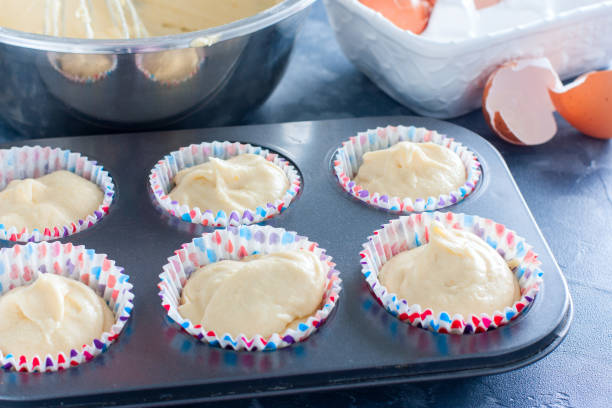istock Raw muffins in a metal mold before baking, horizontal 1191226004