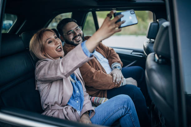 istock Friends taking selfie in the car 1191231976