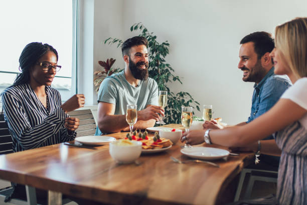 istock Friends having dinner at home. 1191233040