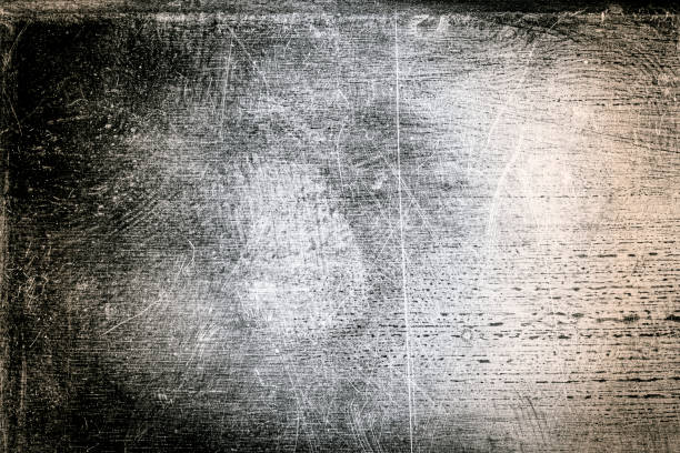 istock Scratched dirty dusty copper plate texture, black and white image. 1191234495