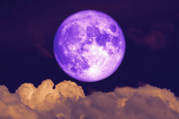 istock super purple Beaver Moon back dark heap cloud on the night sky 1191235866
