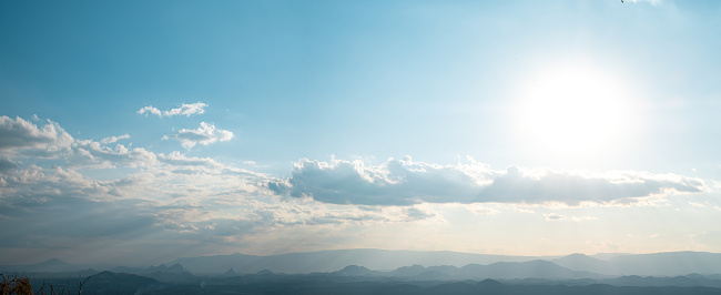 Beautiful sun sky cloud at the mountain range and the city in the background, Photo Loei  city Thailand from Phu Bo Bit mountain peak