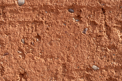 clay earthen wall texture background red - stock image 2019