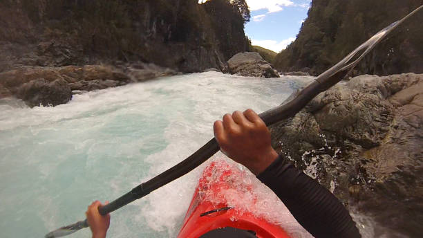 istock White water kayaker paddles down river 1191241085
