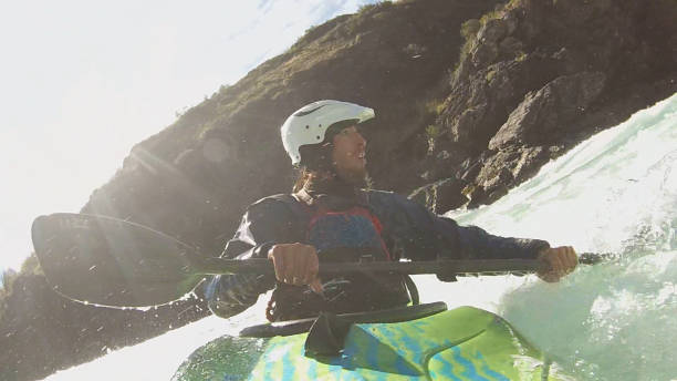 istock White water kayaker paddles down turbulent river 1191241157