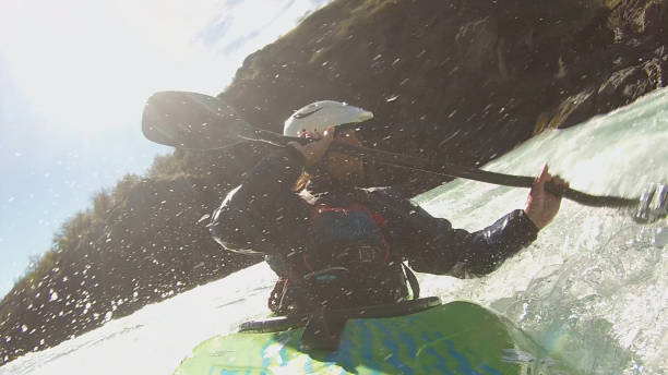 istock White water kayaker paddles down turbulent river 1191241219