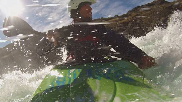 istock White water kayaker paddles down turbulent river 1191241444
