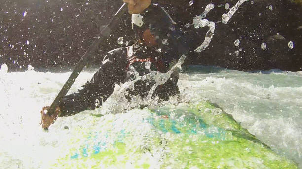 istock White water kayaker paddles down turbulent river 1191241517