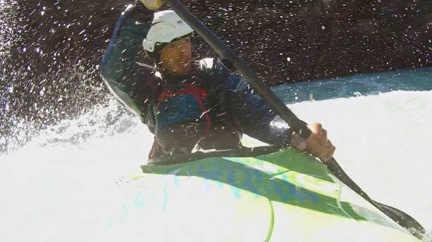 istock White water kayaker paddles down turbulent river 1191241612