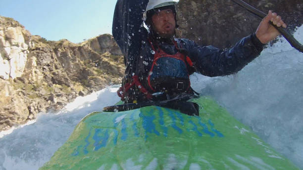 istock White water kayaker paddles down turbulent river 1191241843