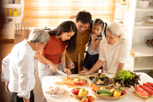 istock Family cooking in the kitchen. 1191241874
