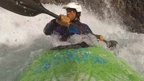 istock White water kayaker paddles down turbulent river 1191241952