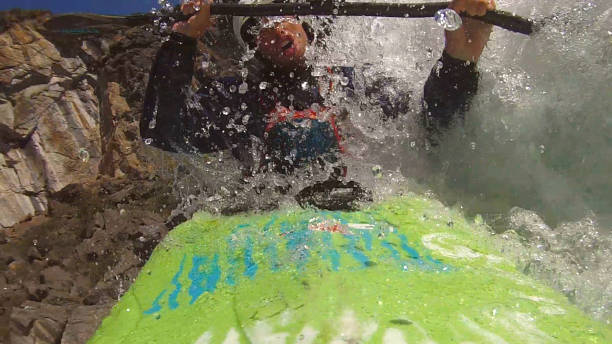 istock White water kayaker paddles down turbulent river 1191242525