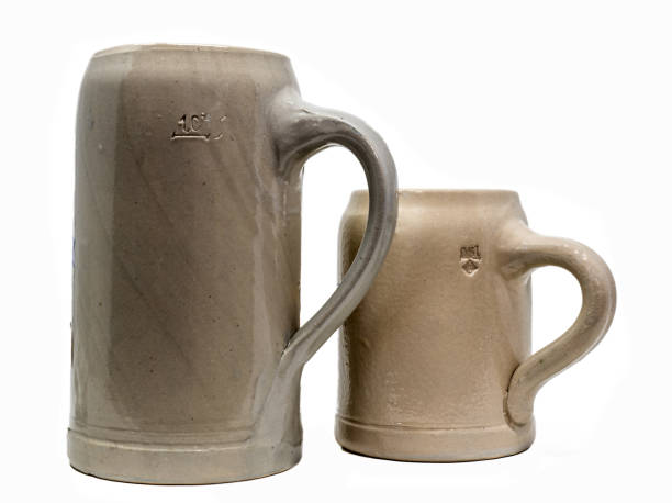 istock Two Bavarian Beer Mug made of stoneware with handle isolated 1191243859
