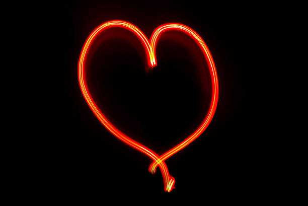 Heart symbol written with red lights