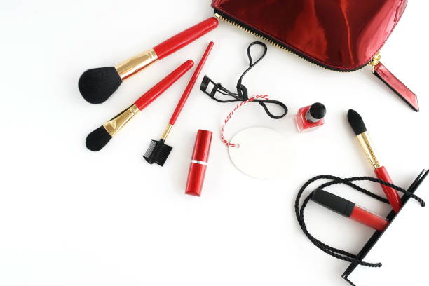 istock Set of professional decorative cosmetics, makeup tools and  cosmetic bag on white background top view. banner. Flat lay womens make up brushes, lipstick, pouder. Copy space 1191246311