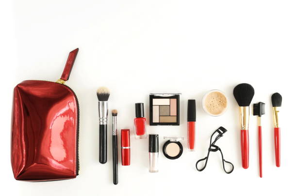 istock Set of professional decorative cosmetics, makeup tools and  cosmetic bag on white background top view. banner. Flat lay womens make up brushes, lipstick, pouder. Copy space 1191246591