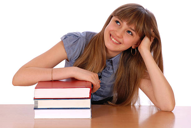 istock Girl sits at table and has put a hand 119124794