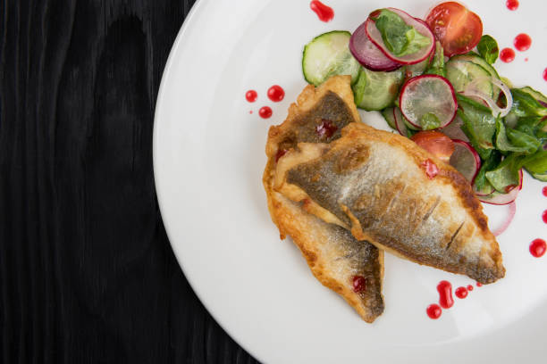 istock Fillet of zander with vegetables 1191249455