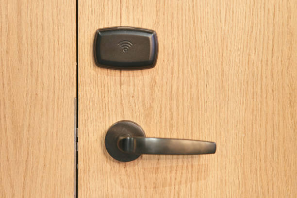 istock Door handle with electronic lock in hotel close up 1191250124