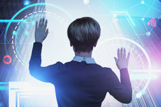 istock Businesswoman working with HUD interface in city 1191250177