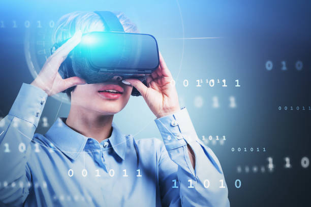 istock Woman in VR headset, binary numbers HUD 1191250292