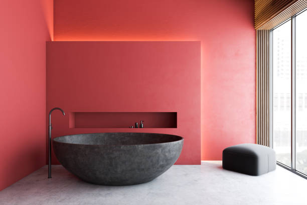 istock Red minimalistic bathroom with gray tub 1191250535