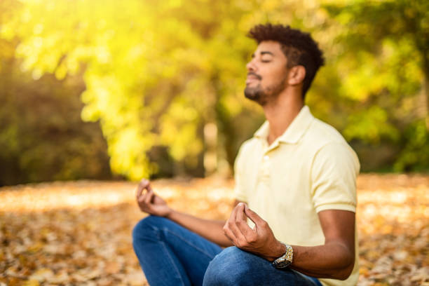 istock Young man taking a break in nature and meditating. 1191250929
