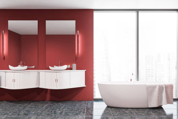 istock Panoramic red bathroom with double sink and tub 1191251749