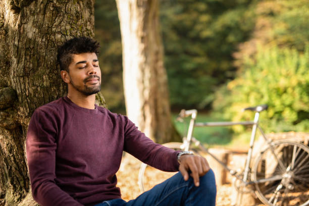 istock Young man sleeping in nature. 1191251788
