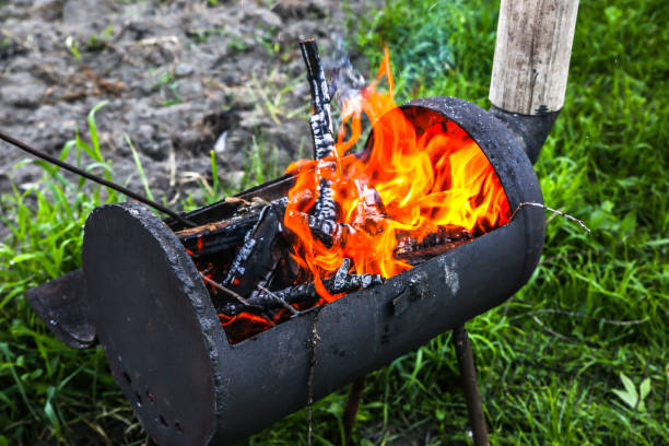 istock Place for barbecue outdoors. Fire with wood. Summer time for grill. 1191252202