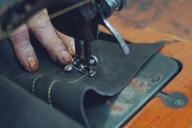 istock Close up of Store handmade leather belts background 1191253452