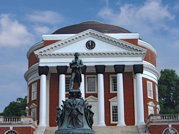 Statue of founder Thomas Jefferson in front of the University of Virginia Rotunda Charlottesville, Virginia, USA - June 11, 2014: Statue of the university's founder Thomas Jefferson in front of the University of Virginia Rotunda, by sculptor Ezekial Moses (died 1917), has become controversial as Jefferson was a slave owner. rotunda stock pictures, royalty-free photos & images