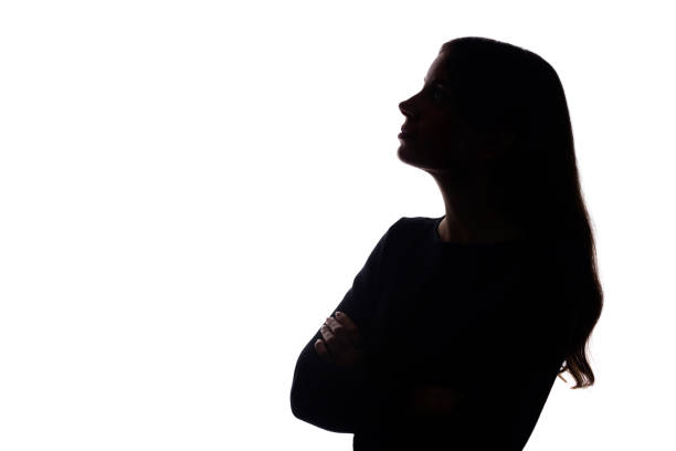istock Portrait beautiful young girl looking up concept - silhouette, isolate 1191256640