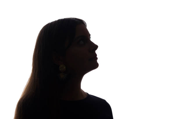 istock Portrait beautiful young girl looking up concept - silhouette, isolate 1191256731