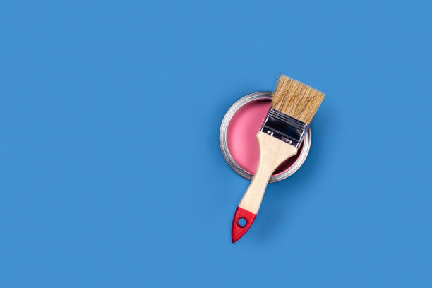 istock Blue background with paint jar and brush. 1191256769