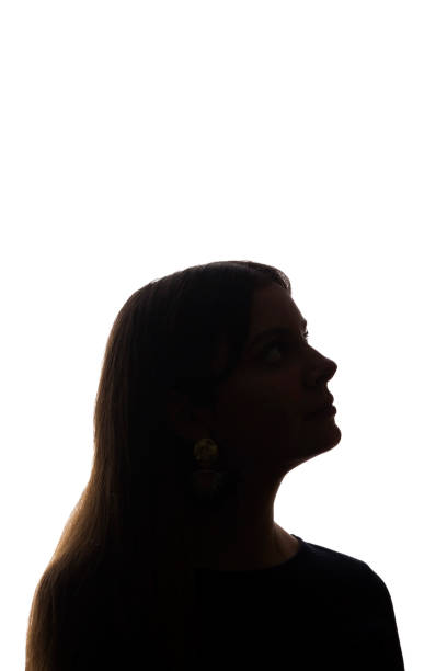 istock Portrait beautiful young girl looking up concept - silhouette, isolate 1191256801