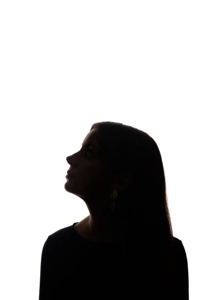 istock Portrait beautiful young girl looking up concept - silhouette, isolate 1191256979