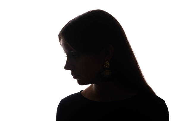 istock Portrait beautiful young girl looking down concept - silhouette, isolate 1191257053