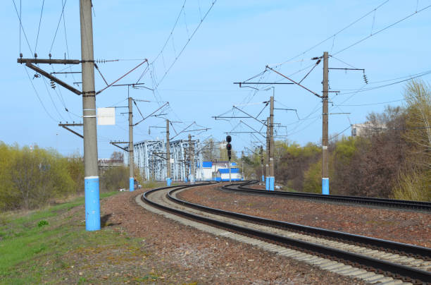 istock Landscape with electrified railway lines 1191257595