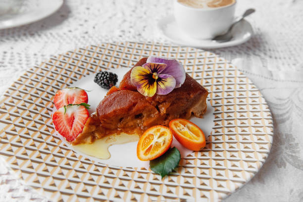 istock Apple dessert with cinnamon on a plate on the table in a restaurant. 1191258790
