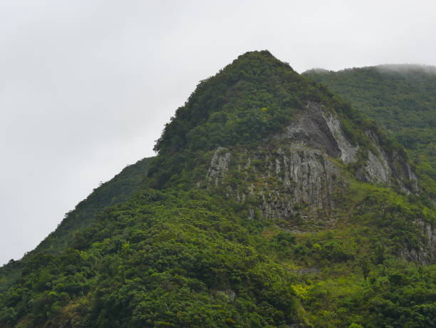 istock mountains and clouds on a tropical island 1191261808