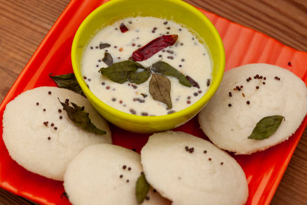 istock Idli with Nariyal or Coconut Chutney served in a plate. 1191261908