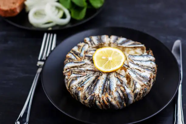 Pilaf with hamsi fish. Traditional Turkish food - Kapama Pilav
