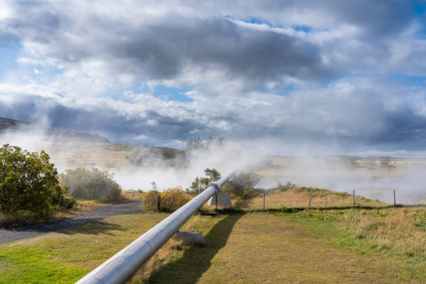 geothermal pipeline in Iceland geothermal pipeline in Iceland, transporting hot water from hot springs in Iceland geothermal reserve stock pictures, royalty-free photos & images