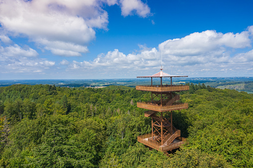 Aerial view of Wiezyca. Observation Tower. Kashubian Landscape Park. Kaszuby. Poland. Photo made by drone from above. Bird eye view.